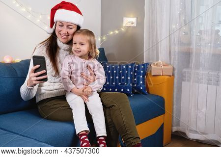Family Christmas Celebration At Home During Covid Pandemic, On-line Greetings, Call Friends And Rela