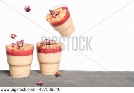 Levitating Food. Apple Mousse With Strawberry Filling And Apple Slices Decorated With Rose Buds. Aut
