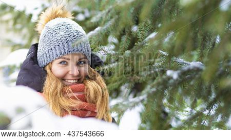 Portrait Beautiful Happy Girl Whitework Smile Teeth, Blue Eyes On Spruce Background In Frosty Day. A