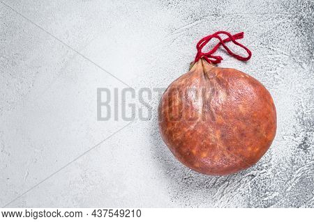 Sobrassada Cured Meat Sausage From Ground Pork, Paprika And . White Background. Top View. Copy Space