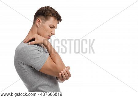 Frustration Sad Handsome Young European Man Suffer From Elbow Pain, Touching Hand With Painful Facia