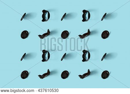 A Pattern Of Photo Accessories - Lens Caps And Lens Hoods.