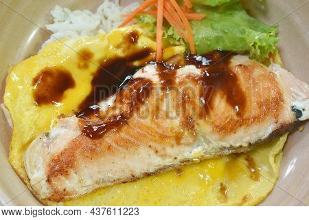 Grilled Salmon With Egg Dressing Teriyaki Sauce Topping On Japanese Rice In Bowl