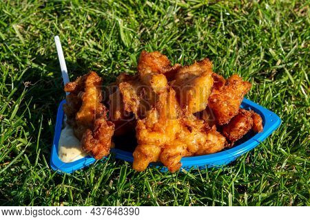 Portion Of Diep-fried Cod Fish Pieces Served With Remoulade Sauce