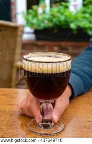 Glass Of Dark Tasty Belgian Dubbel Brown Beer From Abbey Brewery