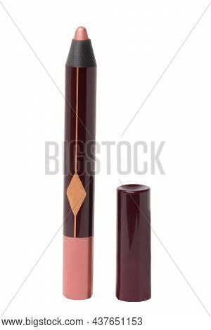 Cosmetic Tools. Macro Shot Of A Black Red Permanent Eyeliner Or Eye Contur Pencil Isolated On A Whit