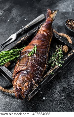 Hot Smoked Pike Perch Or Zander Fish In A Wooden Tray. Black Background. Top View