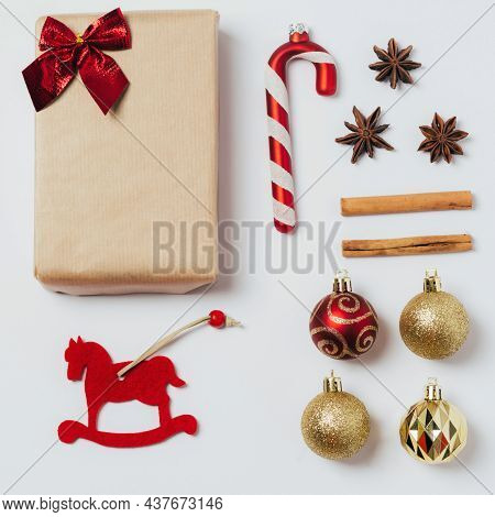 Christmas Composition. Gift, Christmas Gold And Red Decorations. Layout For The Holiday. Top View, F