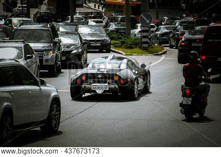 Kiev, Ukraine - June 19, 2021: Spyker C8 Laviolette. Black Luxury Supercar Spyker On The Road