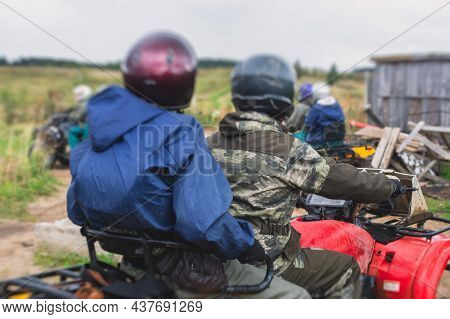 Group Of Riders Riding Atv Vehicle On Off Road Track, Process Of Driving Atv Vehicle, All Terrain Qu