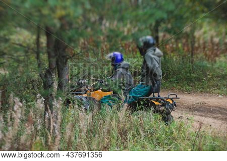 Group Of Riders Riding Atv Vehicle On Off Road Track, Process Of Driving Atv Vehicle, All Terrain Qu