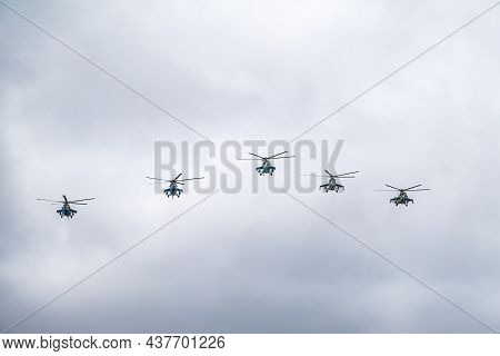 Moscow, Russia - May, 09, 2021: Mi-35m Attack Helicopters In The Sky Over Moscow During The Parade D