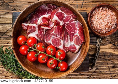 Italian Sliced Cured Coppa Ham With . Wooden Background. Top View