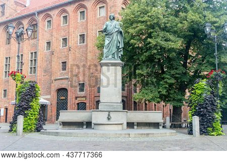 Torun, Poland - July 26, 2021: Nicolaus Copernicus Monument In The Home Town Of Astronomer Nicolaus 