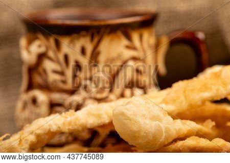 Fried Bread Sticks With Salt And A Ceramic Mug, Close-up, Selective Focus