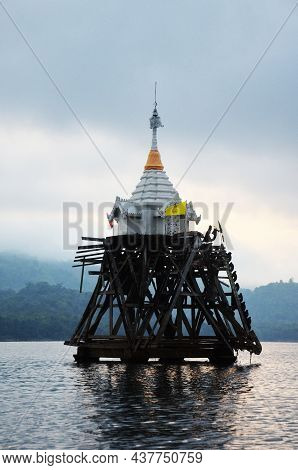 Ancient Antique Ruins Ubosot Of Wat Sri Suwan Drown Deep Underwater Of Songkalia River At Sunset Daw