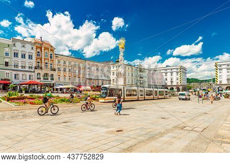 Linz - June 2020, Austria: View Of The Main Square In Linz On A Sunny Summer Day. A Group Of People 