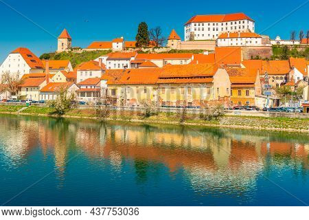 Ptuj - March 2021, Slovenia: View Of The Ancient Slovenian Town Of Ptuj Reflected In The Water
