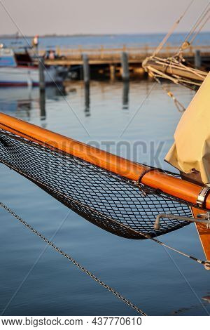 Details Of A Sailboat. A Sailboat With A Hull Made Of The Finest Machined Wood.