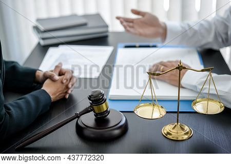 Businessman Is Bringing The Legal Document For Consultation With Female Lawyer And She Is Explaining