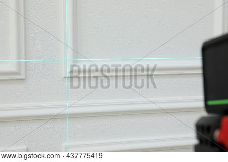 Cross Lines Of Laser Level On White Wall