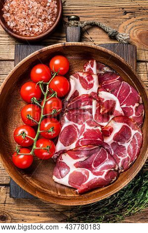 Italian Sliced Cured Coppa Ham With . Wooden Background. Top View