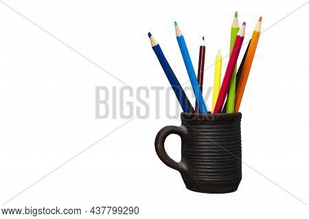 Colored Funny Pencils In A Clay Cup Isolated On A White Background, Colored Pencils In A Clay Cup. D