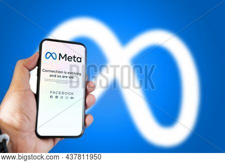 Menlo Park, Ca, Usa, October 28 2021: Hand Holding A Phone With The Meta Mobile App On The Screen An