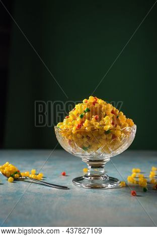 Bundi- a deep fried traditional Indian sweet served in a bowl. Indian dessert and sweet.