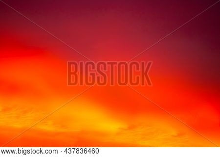 Blur Abstract Evenings Sky Bakcground. Smooth Colorful Orange Yellow And Red Sunrise Nature Display.