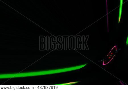 Colorful Light Reflections On A Black Background