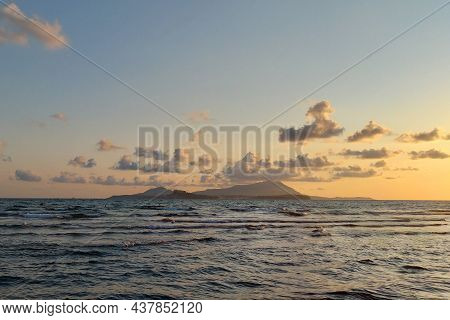 Beatiful Sunset Of Ending Summer On The Naples Coast, Procida And Ischia Islands On Background.