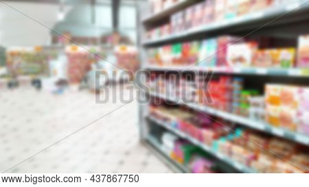 Abstract Blur Image Of Supermarket Background. Defocused Shelves With Goods And Product. Grocery. Re