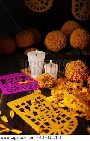 Candles With Cempasuchil Orange Flowers Or Marigold. (tagetes Erecta) And Papel Picado. Decoration T