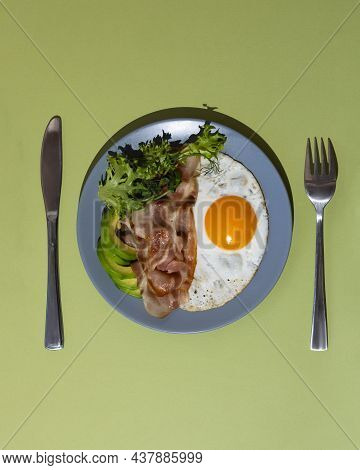 Healthy Keto Breakfast - Bacon, Fried Eggs, Avocado And Microgreens. Low In Carbohydrates, High In F