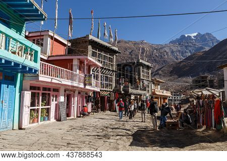 Ranipauwa, Mustang District, Nepal - November 20, 2016: Ranipauwa Village Street. Tourists On The St