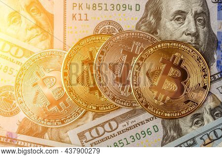 Golden Bitcoin Lies On The Banknotes.new Virtual Money. Crypto Currency Top View. Real Coins Of Bitc
