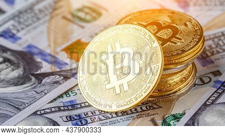 Golden Bitcoin Lies On The Banknotes.new Virtual Money. Crypto Currency Top View. Real Coins Of Bitc