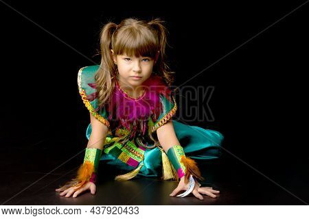 Pretty Little Girl Crawling On Floor. Portrait Of Beautiful Preteen Girl Dressed Bright Ethnic Costu