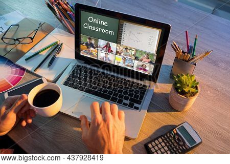 Hands of man using laptop for video call, with diverse elementary school pupils on screen. communication technology and online education, digital composite image.