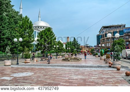 Shkoder, Albania - June 21, 2021: Cityscape On Rruga Kole Idromeno Street In Shkodra. People Walk Al