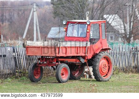 Krasnyy Voskhod, Russia - October 17, 2021: Red Tractor Automotive Chassis T-16 In A Countryside.