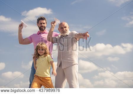 Men Generation: Grandfather Father And Grandson Playing With Toy Plane Outdoor On Sky. Boy Dreams Of