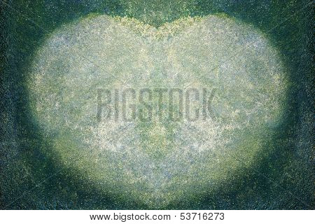 moss growing on cement floor in the  shape of heart