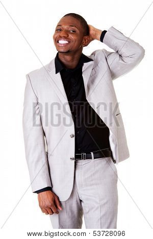 Male handsome busnessman smiling. Hand behind his head. Isolated on white.