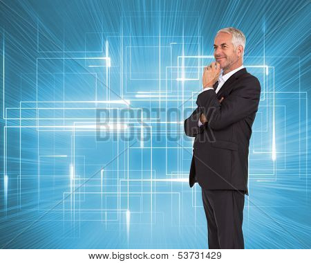 Composite image of happy mature businessman looking away