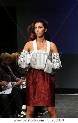 ZAGREB, CROATIA - NOVEMBER 07: Fashion model wearing clothes designed by Mitak and Gregl on the Fashion Wardrobe show on November 07, 2013 in Zagreb, Croatia.