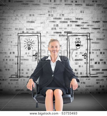 Composite image of blonde businesswoman sitting on swivel chair in black suit