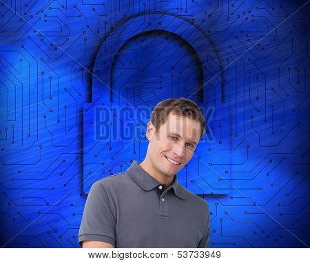 Composite image of smiling young man with tablet computer 
