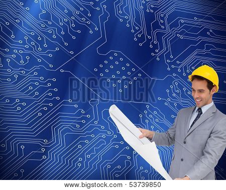Composite image of smiling architect with hard hat looking at plans